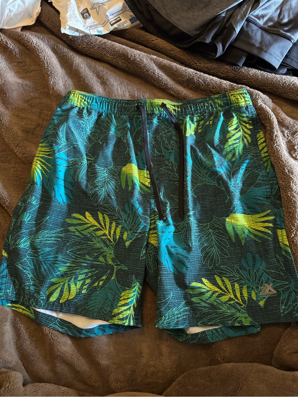 ZeroXposur Teal & Yellow Tropical Leaf Swim Shorts